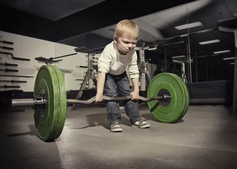 Boy Lifting Heavy